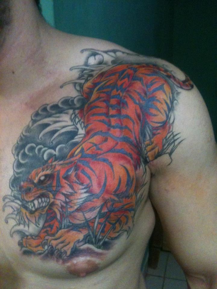Wonderful Tiger Tattoo On Man Left Chest