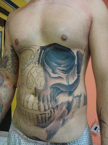 3D Skull Tattoo On Man Stomach