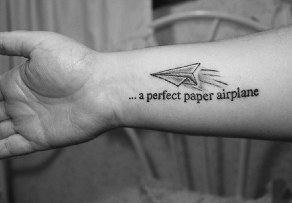 A Perfect Paper Airplane - Black Ink Paper Airplane Tattoo On Right Forearm