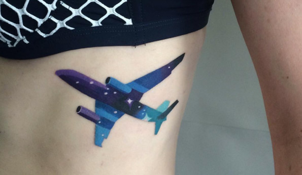 Abstract Airplane Tattoo On Left Side Rib