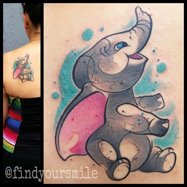 Abstract Elephant Dumbo Tattoo On Women Left Back Shoulder