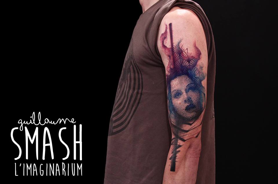 Abstract Face Tattoo On Man Left Half Sleeve By Guillaume Smash