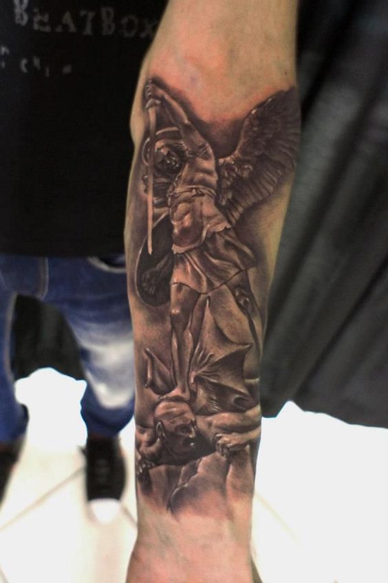 Amazing Black Ink Archangel Michael Tattoo On Forearm By Greek