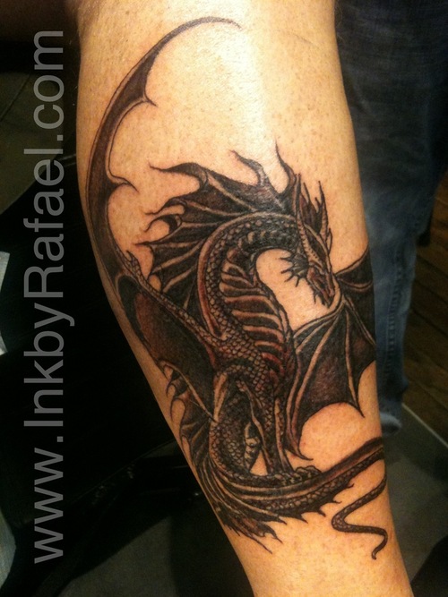 Amazing Black Ink Dragon Tattoo On Leg Calf