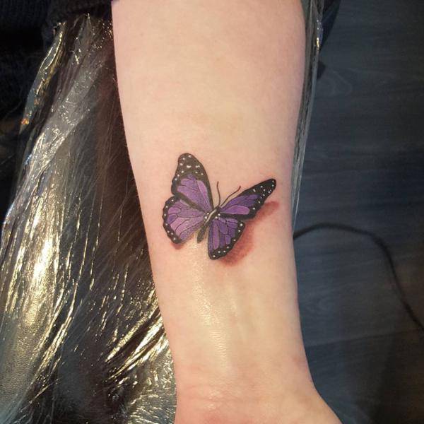 Amazing Purple Butterfly Tattoo On Left Wrist