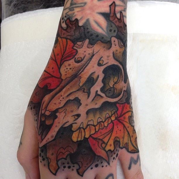 Animal Skull Tattoo On Left Hand