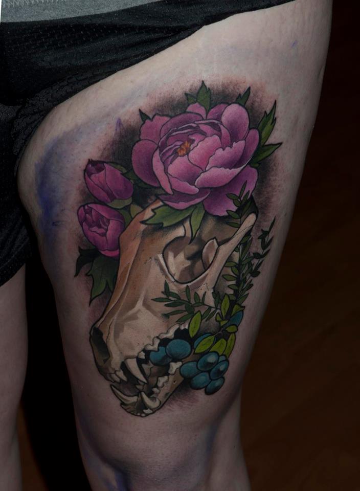 Animal Skull With Flowers Tattoo On Left Thigh