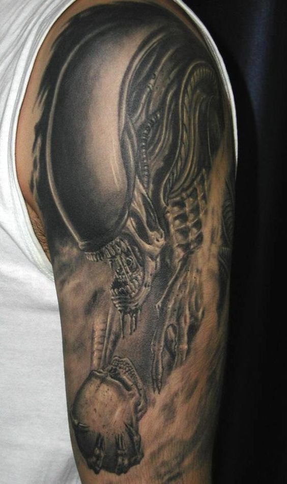Attractive Black And Grey Alien Tattoo On Left Shoulder