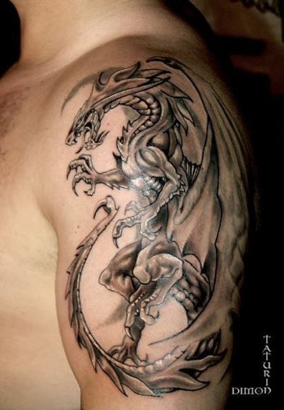 Attractive Black And Grey Dragon Tattoo On Man Left Shoulder