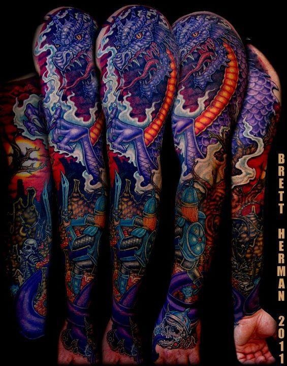 Attractive Colorful Dragon Tattoo On Man Left Full Sleeve