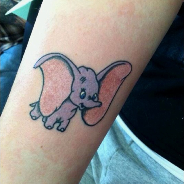 Attractive Dumbo Flying Tattoo On Left Half Sleeve