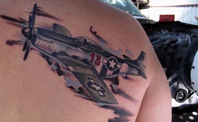 Attractive Flying Airplane Tattoo On Right Back Shoulder