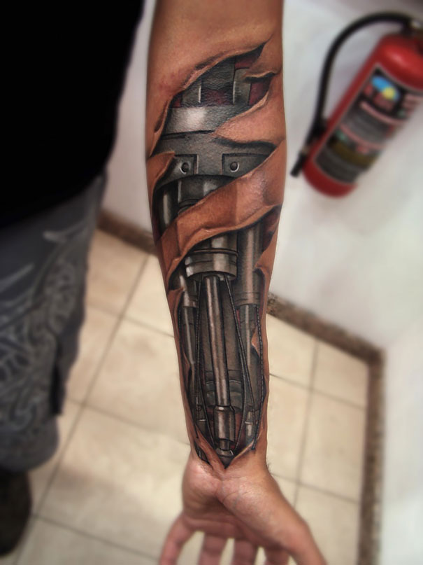 Attractive Ripped Skin 3D Biomechanical Tattoo On Left Forearm