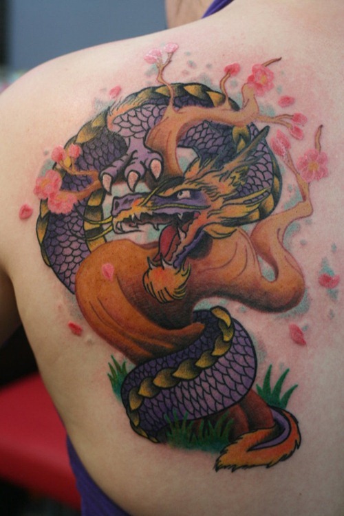 Attractive Traditional Dragon Tattoo On Girl Left Back Shoulder