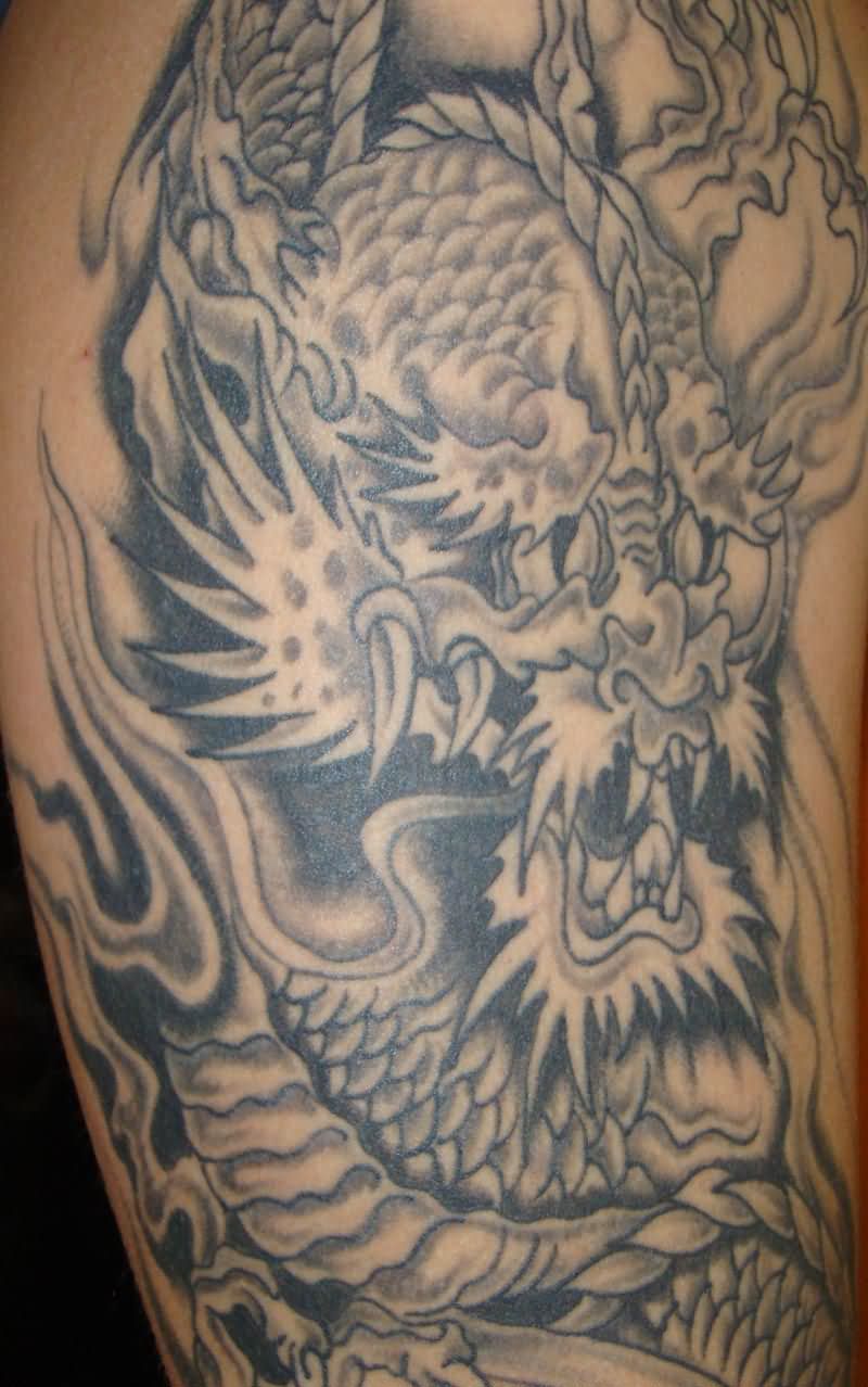 Awesome Black And Grey Dragon Tattoo On Right Half Sleeve