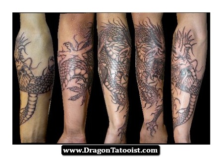 Awesome Black Ink Dragon Tattoo On Forearm