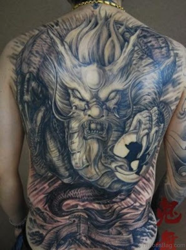 Awesome Black Ink Dragon Tattoo On Full Back