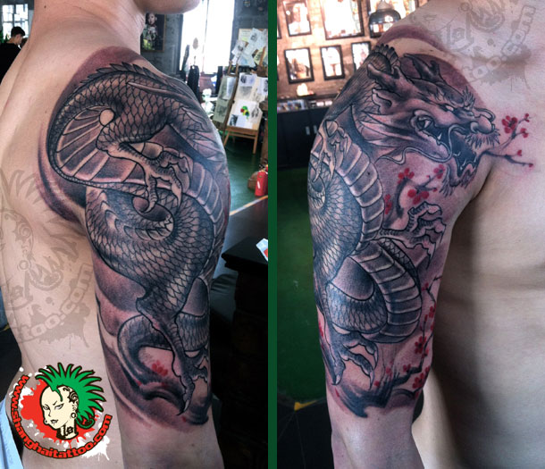 Awesome Black Ink Dragon Tattoo On Man Right Half Sleeve