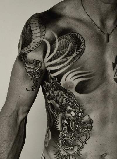 Awesome Black Ink Dragon Tattoo On Right Side Rib