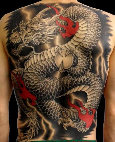 Awesome Black Ink Japanese Dragon Tattoo On Man Full Back