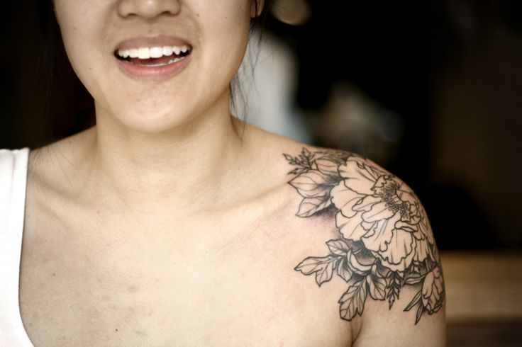 Awesome Black Ink Peony Flower Tattoo On Women Left Shoulder