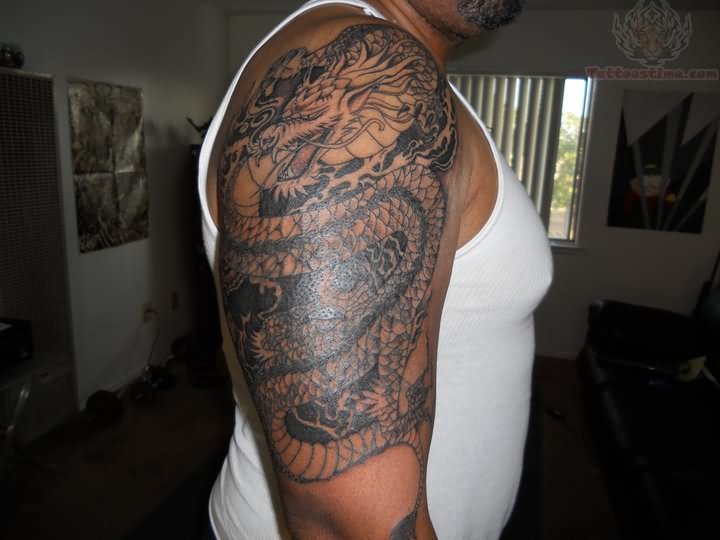 Awesome Classic Black Ink Dragon Tattoo On Man Right Half Sleeve