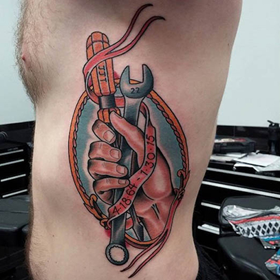 Awesome Color Ink Memorial Tattoo On Man Side Rib