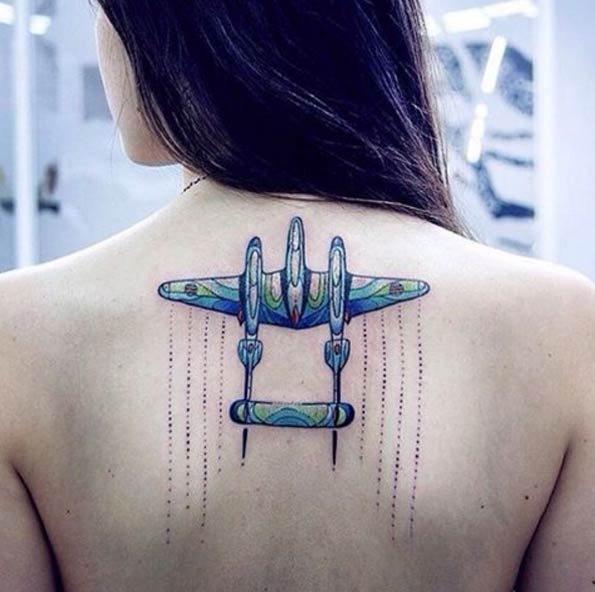 Awesome Colorful Airplane Tattoo On Women Upper Back