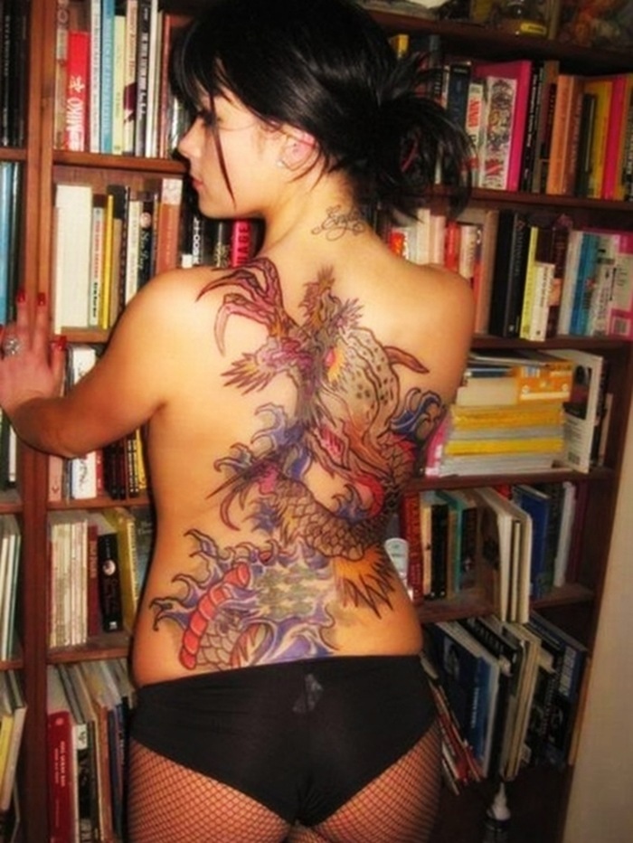 Awesome Colorful Traditional Dragon Tattoo On Girl Full Back
