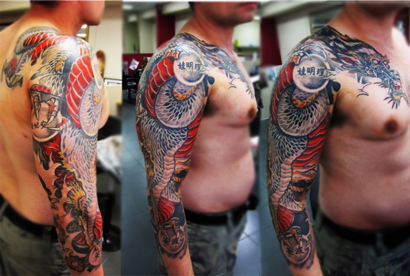Awesome Traditional Dragon Tattoo On Man Right Full Sleeve