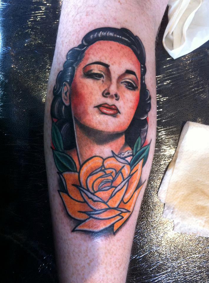 Awesome Women Face With Rose Tattoo On Leg