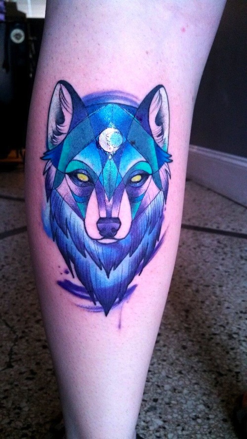 Back Leg Blue Ink Wolf Head Tattoo