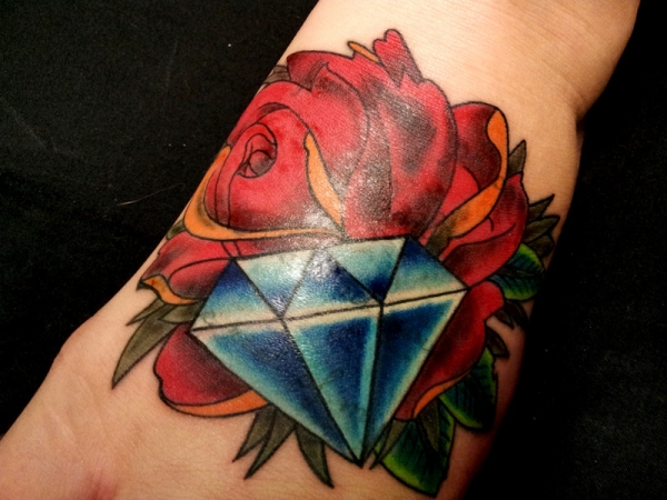 Beautiful red Rose And Diamond Tattoo On Arm