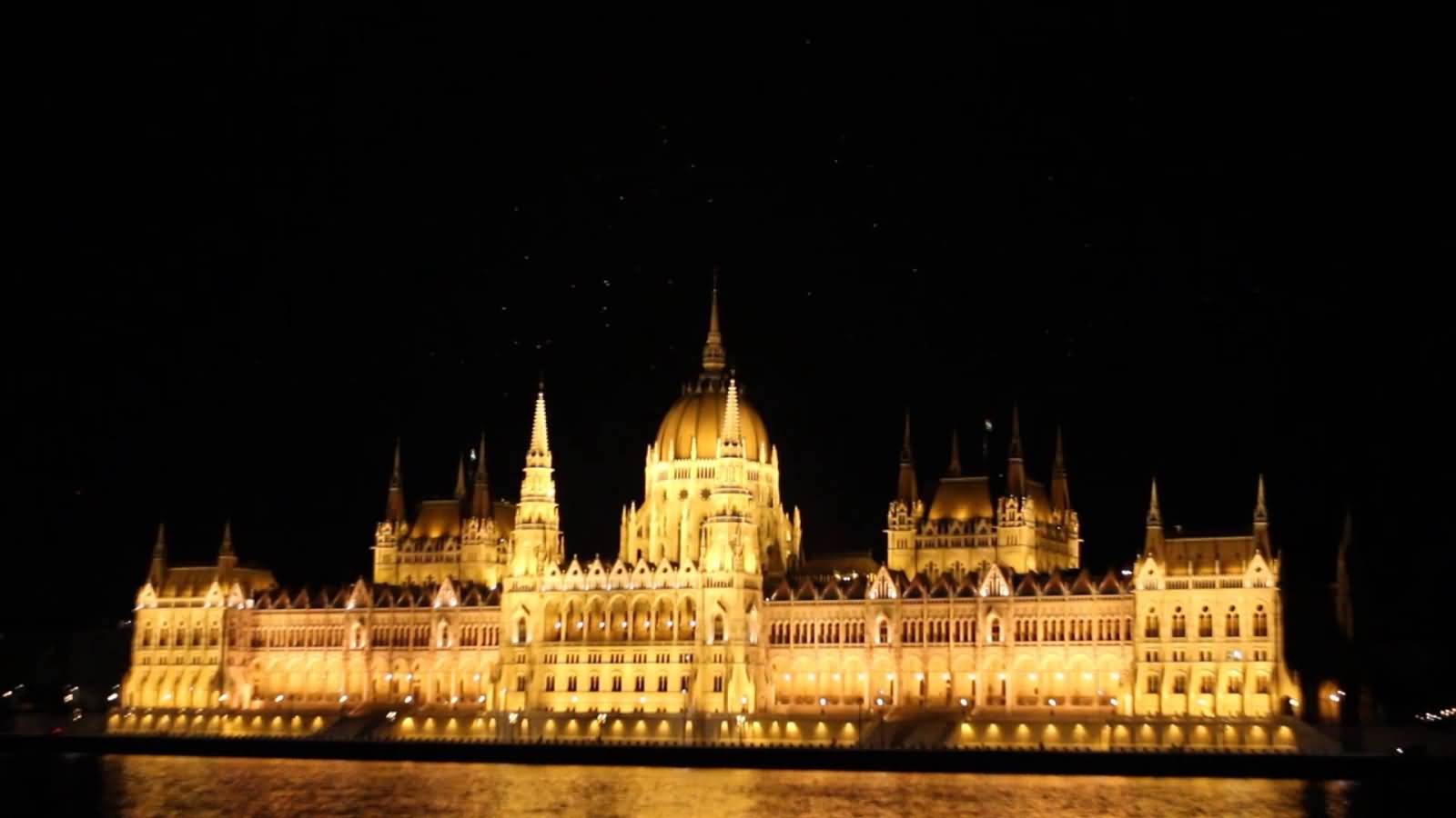 Birds Swirling Over The Hungarian Parliament Building At Night