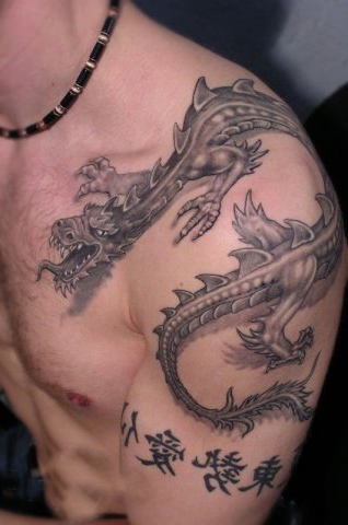 Black And Grey 3D Dragon Tattoo On Man Left Shoulder