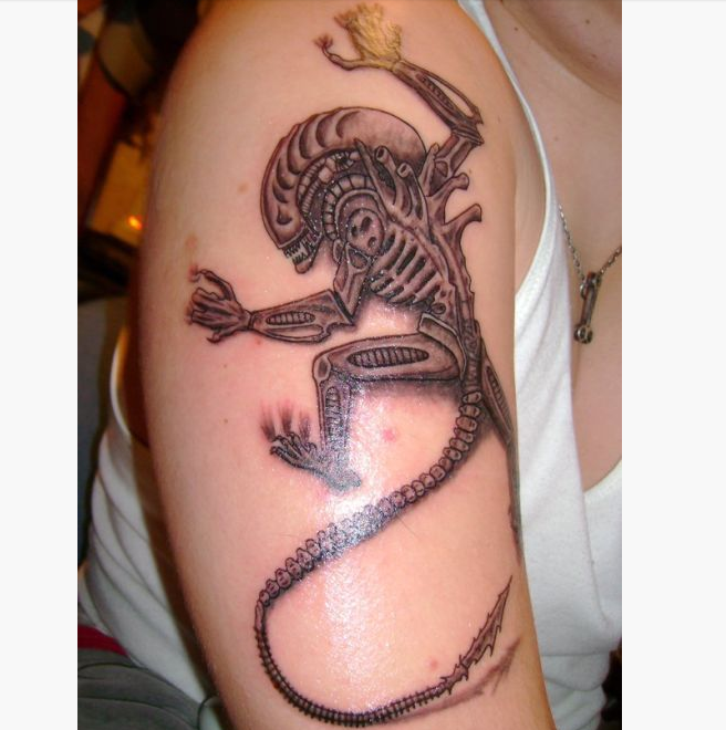 Black And Grey Alien Tattoo On Right Half Sleeve