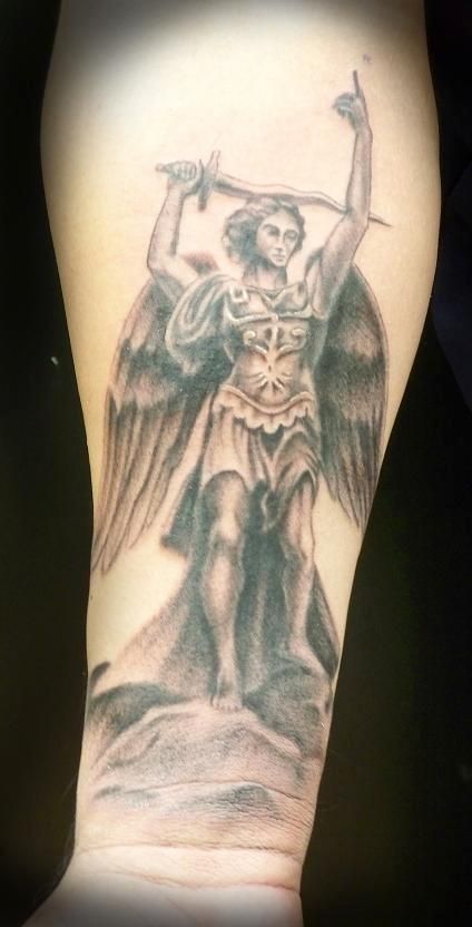 Black And Grey Archangel Michael Tattoo On Forearm