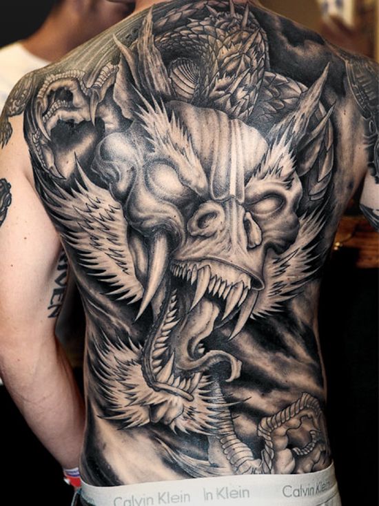 Black And Grey Chinese Dragon Head Tattoo On Man Full Back