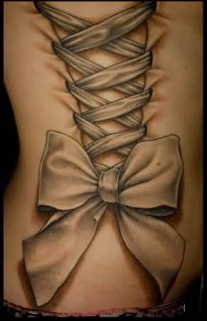 Black And Grey Corset With Bow Tattoo On Full Back