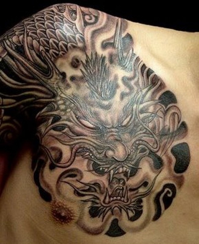 Black And Grey Dragon Tattoo On Man Right Front Shoulder