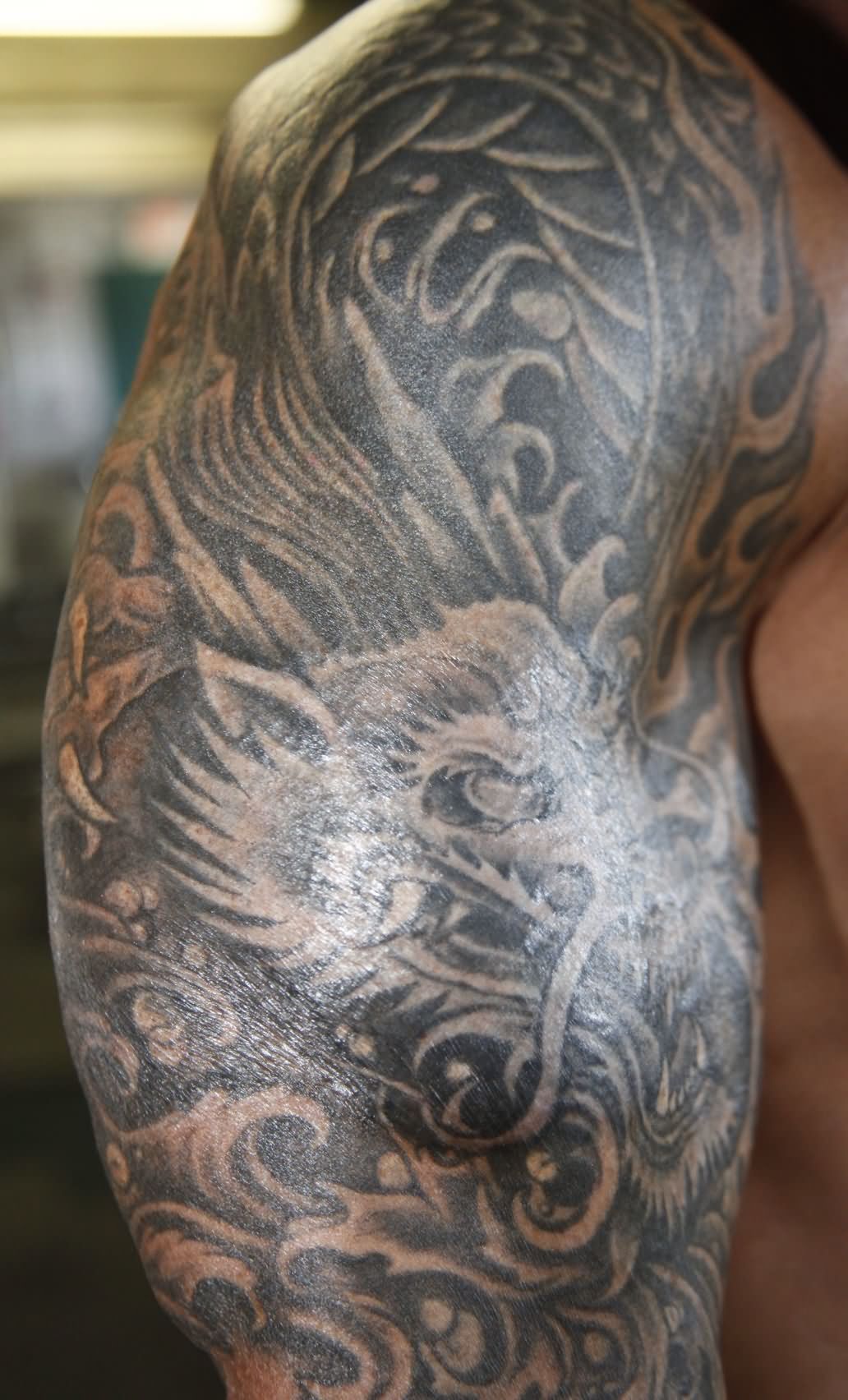 Black And Grey Dragon Tattoo On Right Half Sleeve