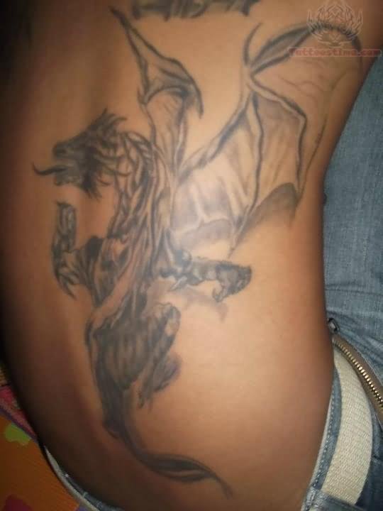 Black And Grey Dragon Tattoo On Right Side Rib