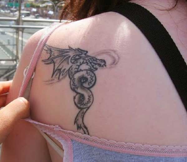 Black And Grey Dragon Tattoo On Women Left Back Shoulder