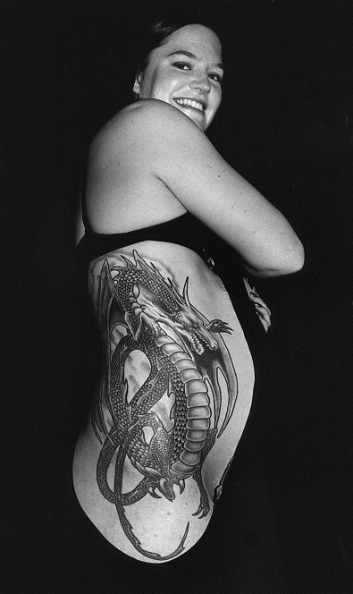 Black And Grey Dragon Tattoo On Women Right Side Rib
