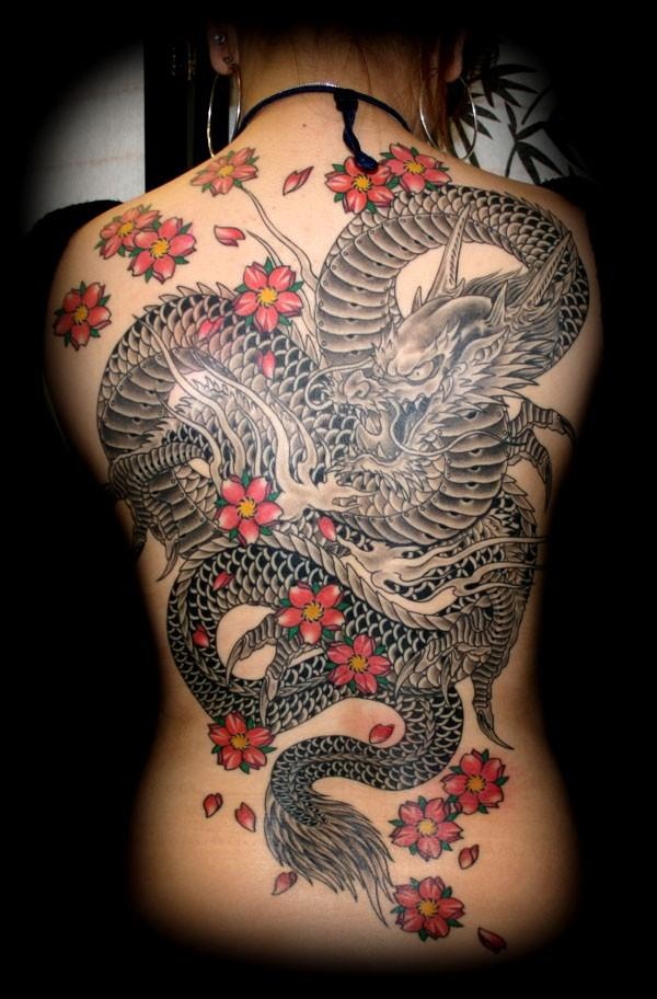 Black And Grey Dragon With Flowers Tattoo On Women Full Back