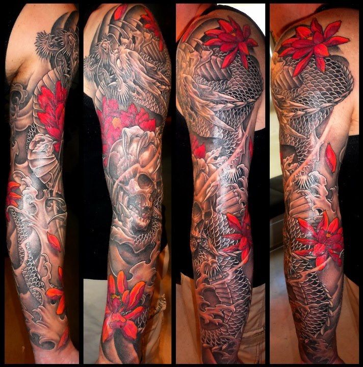 Black And Grey Dragon With Skull And Flowers Tattoo On Man Left Full Sleeve