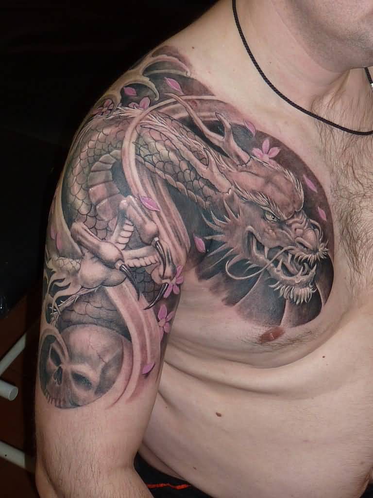 Black And Grey Dragon With Skull Tattoo On Right Shoulder And Chest