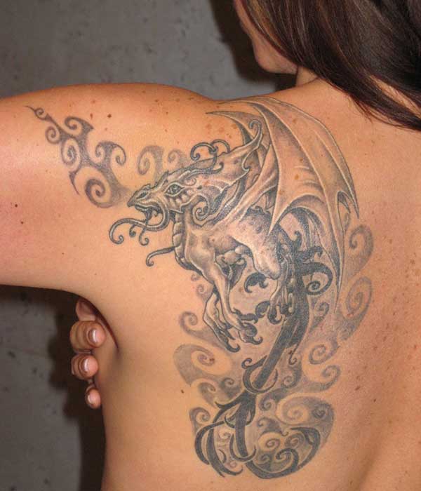 Black And Grey Flying Dragon Tattoo On Women Left Back Shoulder