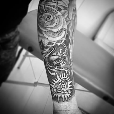 Black And Grey Money Rose With Eye And Diamond Tattoo On Left Sleeve