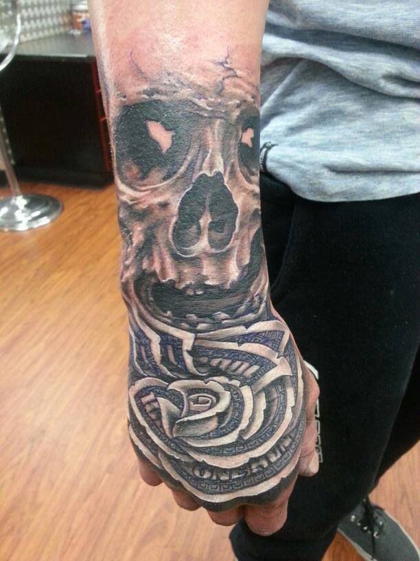 Black And Grey Money Rose With Skull Tattoo On Right Hand